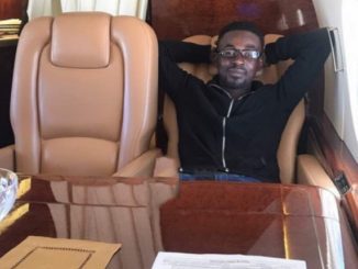 Nana Appiah Mensah in a jet